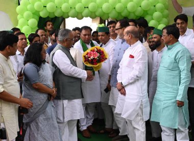 NEW DELHI INDIA SEPTEMBER 19 2024 National leadership of Rashtriya Janata Dal RJD waits to welcome party national president Lalu Prasad Yadav during National Membership Campaign at Delhi Party Office at DDU Marg on September 19 2024 in New Delhi Indi clipart