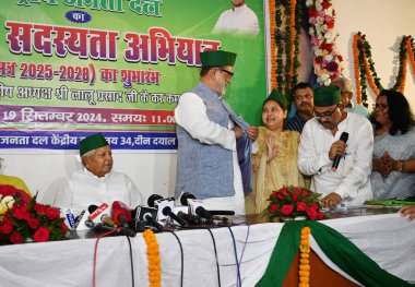 NEW DELHI INDIA SEPTEMBER 19 2024 Rashtriya Janata Dal RJD national president Lalu Prasad Yadav with his daughter and RJD Rajya Sabha MP Misa Bharti during National Membership Campaign at Delhi Party Office at DDU Marg on September 19 2024 in New Del clipart