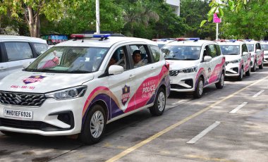 MUMBAI INDIA JULY 11 2023 Mumbai Police Commissioner Vivek Phansalkar along with Mumbai Police Special Commissioner Deven Bharti during the flag off ceremony of the Nirbhaya Squad and Beat Marshals Vehicles to all police stations in Mumbai City at Na clipart