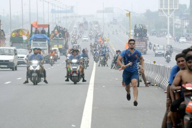 GHAZIABAD INDIA JULY 15 2023 Thousands of Dak Kanwars throng at Delhi Meerut Expressway on the penultimate day of Kanwar yatra on July 15 2023 in Ghaziabad India Photo by Sakib Ali Hindustan Times clipart