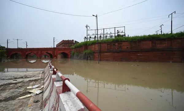 stock image NEW DELHI INDIA JULY 15 2023 A view of a Waterlogged street near Salimgarh Fort after the Yamuna river flows above the Danger Mark at Kashmiri Gate on July 15 2023 in New Delhi India The water level of the river has been rising since Wednesday after 