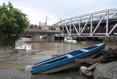 NEW DELHI INDIA JULY 16 2023 Loha Pul near Yamuna Bazar as Receded flood water in the morning on July 16 2023 in New Delhi India The water level of the river has been rising since Wednesday after it breached an all time high mark in more than 45 year clipart