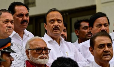 MUMBAI INDIA JULY 16 2023 Maharashtra Dy CM Ajit Pawar and other ministers Ajit Pawar Groupcoming out after meeting NCP Chief Sharad Pawar at Y B Chavan on July 16 2023 in Mumbai India This was the first meeting between Sharad Pawar and the group led clipart