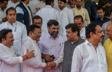 MUMBAI INDIA JULY 17 2023 Sanjay Shirsat Member of the Maharashtra Assembly and Ashok Shankarrao ChavanMember of the Maharashtra Assembly at Vidhan Bhavan during first day of the monsoon session on July 17 2023 in Mumbai India Photo by Satish Bate Hi clipart