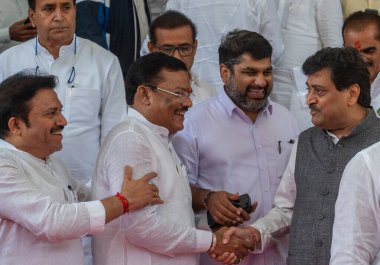 MUMBAI INDIA JULY 17 2023 Sanjay Shirsat Member of the Maharashtra Assembly and Ashok Shankarrao ChavanMember of the Maharashtra Assembly at Vidhan Bhavan during first day of the monsoon session on July 17 2023 in Mumbai India Photo by Satish Bate Hi clipart