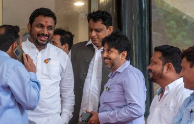 MUMBAI INDIA JULY 18 2023 Amol Mitkari Member of Maharashtra Legislative Council and Indranil Naik Member of the Maharashtra Assembly intracks on the Second day of the monsoon session at Vidhan Bhavan on July 18 2023 in Mumbai India Photo by Satish B clipart