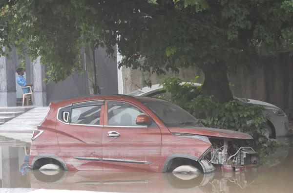 stock image NEW DELHI INDIA JULY 15 2023 A flooded road outside Near Shri Swaminarayan Mandir as the swollen Yamuna river inundates nearby areas at Civil Lines at ITO on July 15 2023 in New Delhi India The water level of the river has been rising since Wednesday