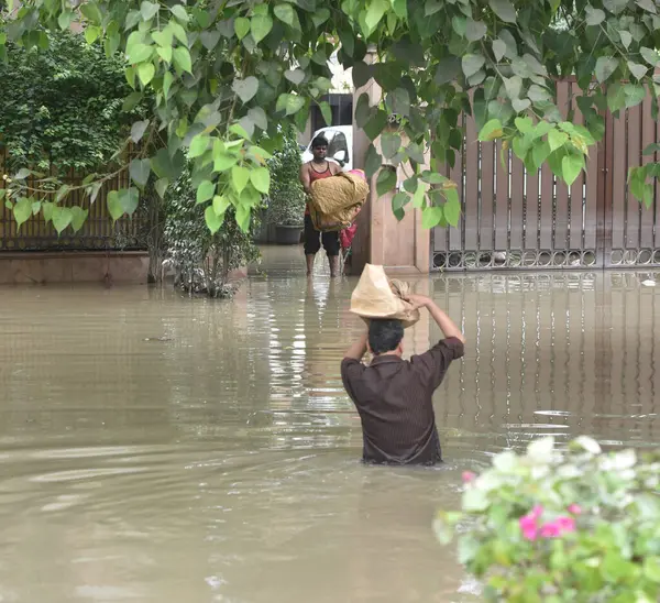 stock image NEW DELHI INDIA JULY 15 2023 A flooded road outside Near Shri Swaminarayan Mandir as the swollen Yamuna river inundates nearby areas at Civil Lines on July 15 2023 in New Delhi India The water level of the river has been rising since Wednesday after 