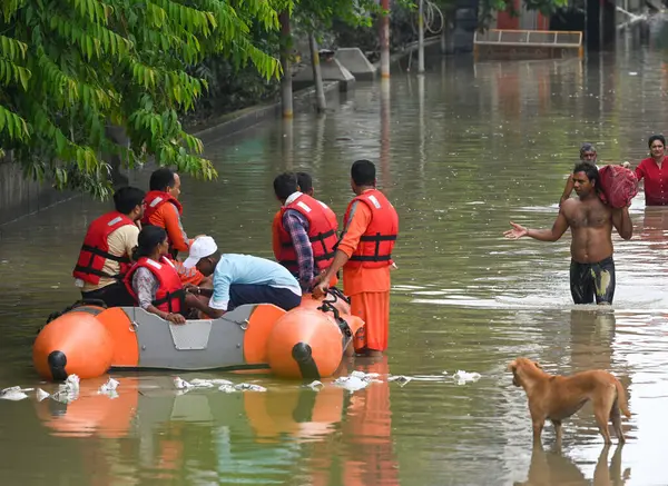 stock image NEW DELHI INDIA JULY 16 2023 NDRF rescue team at Yamuna Bazar Area near Nigam Bodh Ghat area on July 16 2023 in New Delhi India The water level of the river has been rising since Wednesday after it breached an all time high mark in more than 45 years