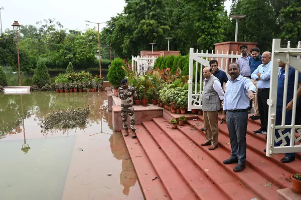 stock image NEW DELHI INDIA JULY 18 2023 Vinai Kumar Saxena Lieutenant Governor of Delhi seen inspecting the ongoing work to pump out flooded water from Rajghat on July 18 2023 in New Delhi India Photo by Sanchit Khanna Hindustan Times