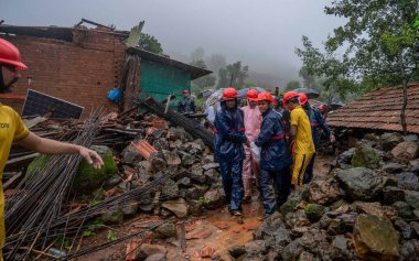 RAIGAD INDIA JULY 20 2023 Rescue operations are going on where people trapped under rubble after landslide in Khalapur Irshalwadi Village on July 20 2023 in Raigad India At least 16 people were killed when a massive landslide struck a remote hilly tr clipart