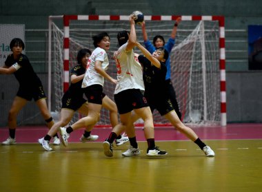 NOIDA INDIA JULY 22 2023 The 10th Asian Womens Youth U18Handball Championship match is currently underway at Noida Stadium featuring an intense face off between China and Japan on July 22 2023 in Noida India This thrilling match serves as the semi fi clipart