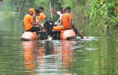 GHAZIABAD INDIA JULY 26 2023 SDRF team on rescue mission in low lying areas in Karhera on Wednesday on July 26 2023 in Ghaziabad India Photo by Sakib Ali Hindustan Times clipart