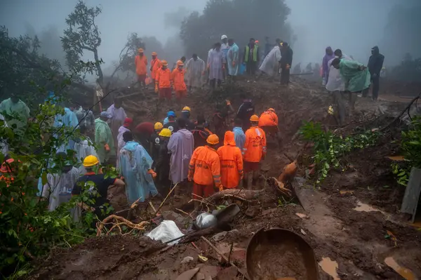 stock image RAIGAD INDIA JULY 21 2023 Rescue operations are going on the second day where people are trapped under rubble after a landslide in Khalapur Irshalwadi Village on July 21 2023 in Raigad India At least 16 people died and over 100 are feared trapped und