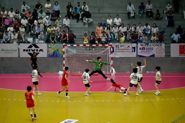 stock image NOIDA INDIA JULY 24 2023 Players of the teams from South Korea and Japan seen during the Handball match on the last day of 10th Asian Womens Youth U18Handball Championship at Noida Stadium on July 24 2023 in Noida India Photo by Sunil Ghosh Hindustan