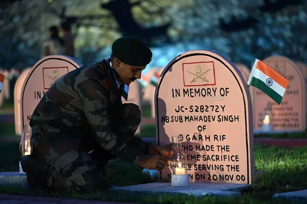 stock image DRASS INDIA JULY 25 2023 Soldiers light candles at Kargil War Memorial in memory of the soldiers who laid down their lives during the 1999 Kargil War ahead of Kargil Vijay Diwas on July 25 2023 in Drass India Photo By Waseem Andrabi Hindustan Times