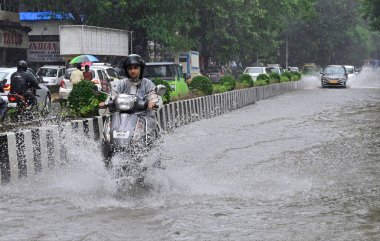 MUMBAI INDIA JULY 27 2023 Water logging at Maharshi Karve Road between Churchgate and Marine Drives on July 27 2023 in Mumbai India Photo by Anshuman Poyrekar Hindustan Times clipart