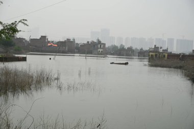 GURUGRAM INDIA JULY 29 2023 Yamuna river flood water logging in houses in Shiv Enclave part three near Basantpur village; several peoples move to their relatives home on July 29 2023 in Gurugram India Photo by Parveen Kumar Hindustan Times clipart