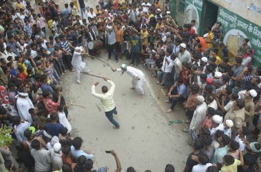 GHAZIABAD INDIA JULY 29 2023 Shia Muslims participate in a Muharram procession at Ward number 4 in Dasna on July 29 2023 in Ghaziabad India Ashura mourns the death of Imam Hussein a grandson of the Prophet Muhammed who was killed by armies of the Yaz clipart