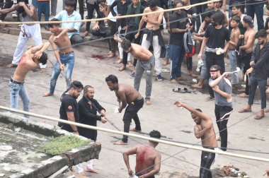 NEW DELHI INDIA JULY 29 2023 Muslim devotees take part in a mourning procession marking the day of Ashura 10 Muharram ul Haram at Shia Jama Masjid Kashmiri Gate on July 29 2023 in New Delhi India Ashura mourns the death of Imam Hussein a grandson of  clipart