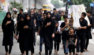 LUCKNOW INDIA JULY 29 2023 Shia Muslims taking out procession in respect of Imam Hussain who was martyred in the Battle of Karbala Small children and women also participated in Muharram procession at old city area on July 29 2023 in Lucknow India Ash clipart