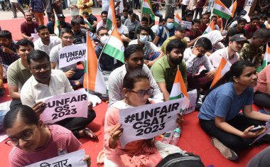 NEW DELHI INDIA JULY 30 2023 Union Public Service Commission UPSCaspirants hold a protest against the unfair Civil Services Aptitude Test CSATdemanding reduction in the cut off for the CSAT exam at Jantar Mantar on July 30 2023 in New Delhi India Pho clipart