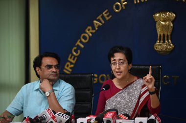 NEW DELHI INDIA SEPTEMBER 25 2024 Delhi Chief Minister Atishi with Delhi Cabinet minister Mukesh Kumar Ahlawat during a press conference at Delhi Secretariat on September 25 2024 in New Delhi India Atishi said that under the leadership of Arvind Kejr clipart