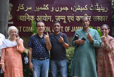 New Delhi India Sept 25 2024: Kashmiri people residence in Delhi and NCR after cast their votes outside the polling station during the second phase of Jammu and Kashmir assembly elections at Jammu and Kashmir House Prithvi Raj Road in New Delhi India clipart