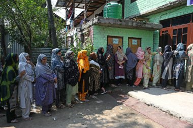 SRINAGAR INDIA SEPTEMBER 25 2024 Voters queue up at a polling booth to cast their vote during the second phase of the assembly election on September 25 2024 in Srinagar India In the second phase of the Jammu and Kashmir assembly polls on Wednesday 20 clipart