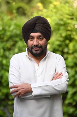 NEW DELHI INDIA AUGUST 31 2023 Congress leader Arvinder Singh Lovely gets congratulated by his supporters and other congress leaders after being appointed as the President of Delhi Pradesh Congress Committee at his residence in Kalindi Colony  clipart