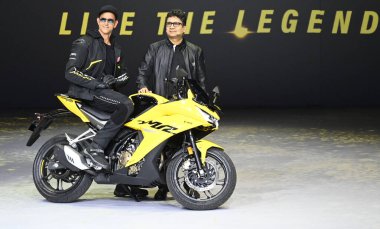 GURUGRAM INDIA AUGUST 29 2023 Hrithik Roshan Bollywood actor and brand ambassador of the Hero Moto Corp and Niranjan Gupta Chief Executive Officer launch the new Hero bike on August 29 2023 in Gurugram India Photo by Parveen Kumar Hindustan Times  clipart