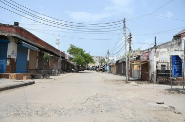 GURUGRAM INDIA AUGUST 28 2023 A view of deserted Nuh Market due to call of Brij Mandal Yatra by Vishwa Hindu Parishad from Naleshwar Mahadev mandir in Nuh on August 287 2023 in Gurugram India Photo by Parveen Kumar Hindustan Times clipart