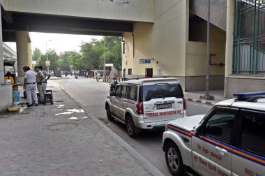 NEW DELHI INDIA AUGUST 27 2023 Forensic experts team investigating the site of pro Khalistan slogans written on the wall removed at Paschim Vihar West Metro Station on August 27 2023 in New Delhi India A fortnight before the national Capital hosts th clipart