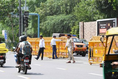 NEW DELHI INDIA AUGUST 27 2023 Traffic is being stopped as Delhi Police along with Traffic Police officials conducts a Carcade Rehearsals for the G20 Delegates ahead of G20 summit at Mathura Road near Pragati Maidan on August 27 2023 in New Delhi Ind clipart