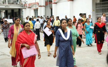 Patna Bihar INDIA Aug 26 2023 2023 Aspirants coming out from an examination centre after appearing in Bihar Public Service Commission BPSC Teacher Recruitment 2023 exam at J D Womens College in Patna Bihar India Saturday Aug 26 2023 Photo by Santosh  clipart