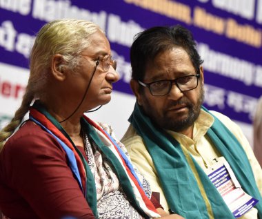 NEW DELHI INDIA AUGUST 24 2023 CPI leader Atul Kumar Anjaan Politician and activist working Medha Patkar during a national convention of workers and farmers jointly organised by Central Trade Unions and Samyukta Kisan Morcha at Talkatora Stadium on A clipart