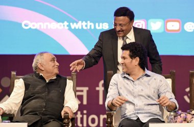 NEW DELHI INDIA AUGUST 23 2023 Former cricketer Sachin Tendulkar with Chief Election Commissioner Rajiv Kumar and Election Commissioner Anup Chandra Pandey during an event where he was recognised as the National Icon of the Election Commission to enc clipart