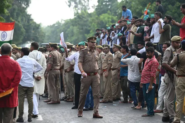 stock image NOIDA INDIA AUGUST 21 2023 A robust contingent of the police force has been strategically deployed to ensure security at the office of Noida MLA Pankaj Singh due to influx of thousands of farmers aiming to lay siege to MLA Pankaj Singhs office on Aug