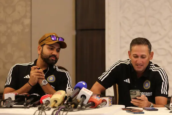 stock image NEW DELHI INDIA AUGUST 21 2023 Indian cricket team captain Rohit Sharma and Chief Selector of senior Men Cricket team Ajit Agarkar address the media on the announcement of Asia Cup Men team at Taj Palace on August 21 2023 in New Delhi India Photo by 