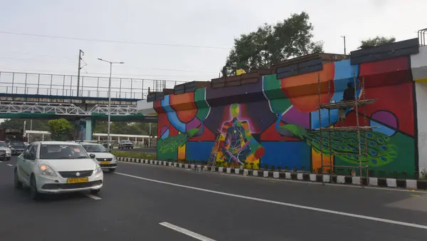 stock image NEW DELHI INDIA AUGUST 17 2023 Wall painting at Ring Road near Pragati Maidan for prepration upcoming G 20 summit on August 17 2023 in New Delhi India The Paintings showcase various features of Indian culture and many Indian Historical icons Photo by