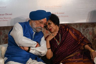 NEW DELHI INDIA AUGUST 14 2023 Hardeep Singh Puri Union Minister along with Member of Parliament Sonal Mansingh during an event to honor personalities who faced tragedy during Partition on Partition Horrors Remembrance Day at The Partition Museum Amb clipart