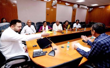 PATNA INDIA AUGUST 12 2023 Bihar Deputy Chief Minister Tejashwi Yadav holding meeting with Asha Sanyukt Sangharsh Manch members at his chamber on August 12 2023 in Patna India Photo by Santosh Kumar Hindustan Times clipart