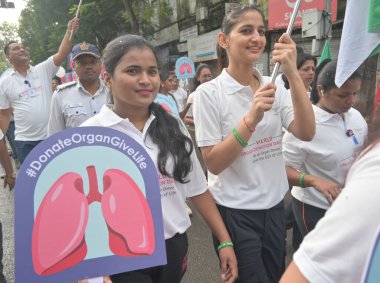 MUMBAI INDIA AUGUST 12 2023 On occasion of World Organ Day people participate in Walkathon organized by H N Reliance Foundation at Girgaon on August 12 2023 in Mumbai India Photo by Anshuman Poyrekar Hindustan Times clipart