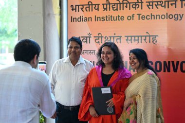 NEW DELHI INDIA AUGUST 12 2023 A Student seen taking pictures with her family members during 54th Convocation of Indian Institute Of Technology Delhi IIT Delhi on August 12 2023 in New Delhi India Photo by Sanchit Khanna Hindustan Times clipart