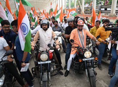 NEW DELHI INDIA AUGUST 11 2023 Anurag Singh Thakur Union Minister for Information & Broadcasting and Youth Affairs & Sports with G Kishan Reddy Minister of Tourism participate in Har Ghar Tiranga Bike Rally of MPs from Pragati Maidan to National Stad clipart