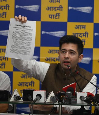 NEW DELHI INDIA AUGUST 10 2023 AAP Rajya Sabha MP Raghav Chadha along with other Member of Parliaments from AAP addresses a press conference over allegations on breach of privilege against Raghav Chadha at AAP HQ at DDU Marg on August 10 2023 in New  clipart