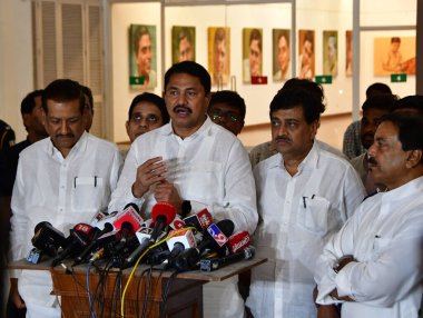 MUMBAI INDIA AUGUST 5 2023 Maharashtra Congress leader Nana Pathole Congress Leader Ashok Chavan along with other leaders leaves after Maha Vikas Aghadi meeting at Nehru Centre on August 5 2023 in Mumbai India NCP chief Sharad Pawar chaired a meeting clipart