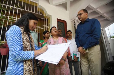 PATNA INDIA AUGUST 2 2023 Patna District Magistrate Chandrashekhar Singh looking enumerator staff who collect information from residents for a caste based census in Bihar after Patna High Court rejected a petition against the survey at Phulwari Shari clipart