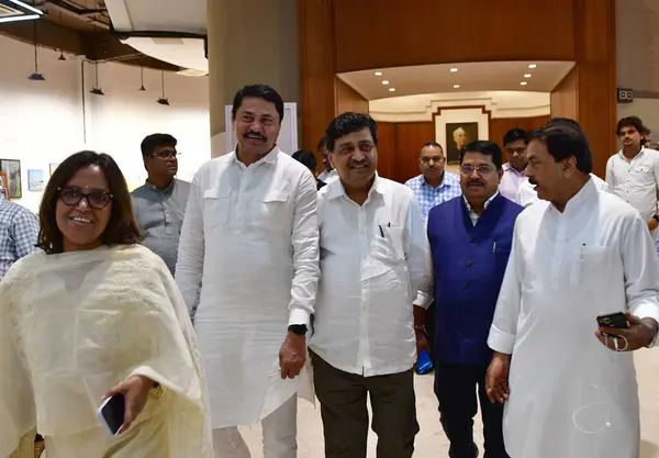 stock image MUMBAI INDIA AUGUST 5 2023 Maharashtra Congress leader Nana Pathole Congress Leader Ashok Chavan along with other leaders leaves after Maha Vikas Aghadi meeting at Nehru Centre on August 5 2023 in Mumbai India NCP chief Sharad Pawar chaired a meeting