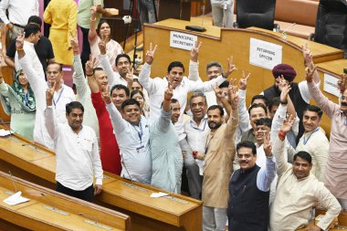 NEW DELHI INDIA SEPTEMBER 27 2024 BJP candidate Sunder Singh Tanwar with other party councillors shows victory sign after the MCD Standing Committee member election at MCD House in New Delhi Friday Sept 27 2024 BJP won the last vacant seat of the MCD clipart